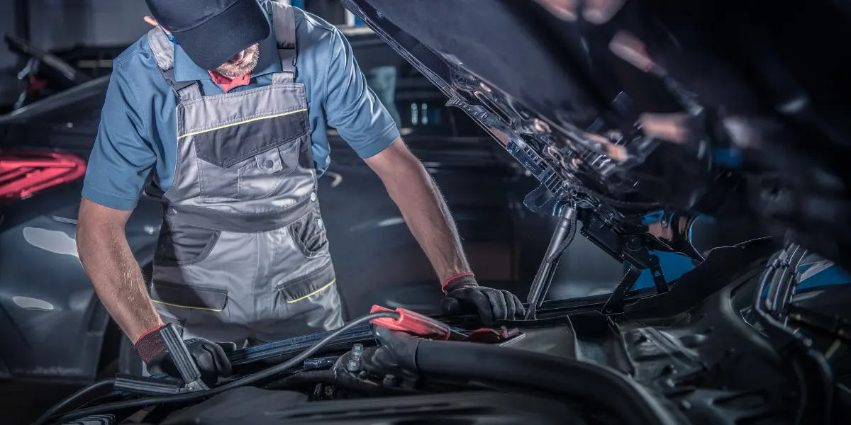 Illustration: technician checking under the hood